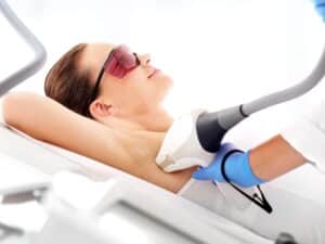 Woman undergoing an underarm laser hair removal