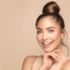Beautiful woman with voluminous cheeks enjoys the benefits of Belotero injections.