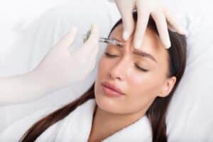 Woman getting injectable treatment for the holidays
