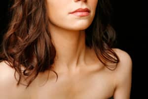 Brunette woman has appealing jawline after cosmetic treatments