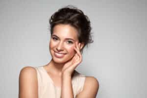 Woman has shiny clear skin after glass skin facial in Plano, TX.